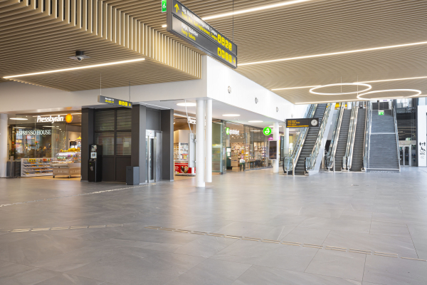 Installation of Caesar ceramic floor tiles in a high-traffic commercial interior